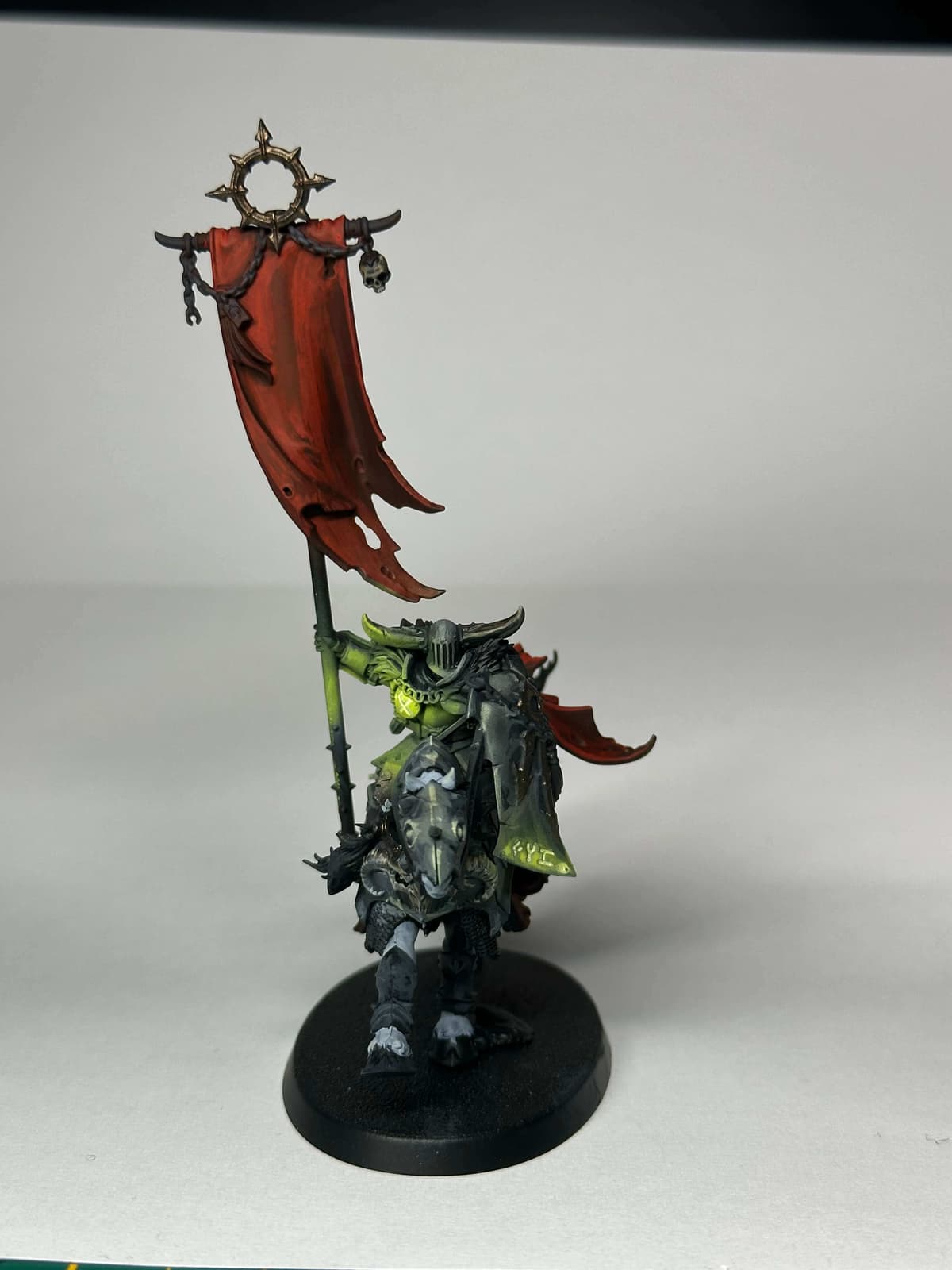 Chaos cavalier holding a banner
